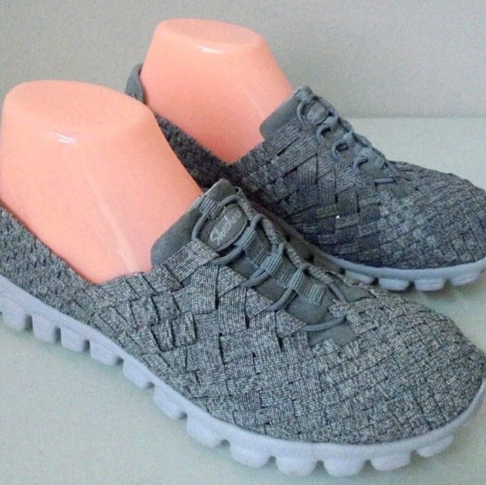 Sketches lightweight memory foam walking shoes.